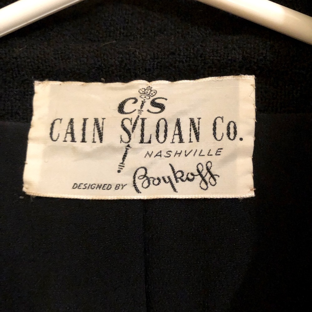 Cain Sloan Woman’s Suit
